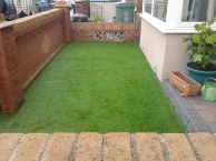 Artifical grass in a small front garden